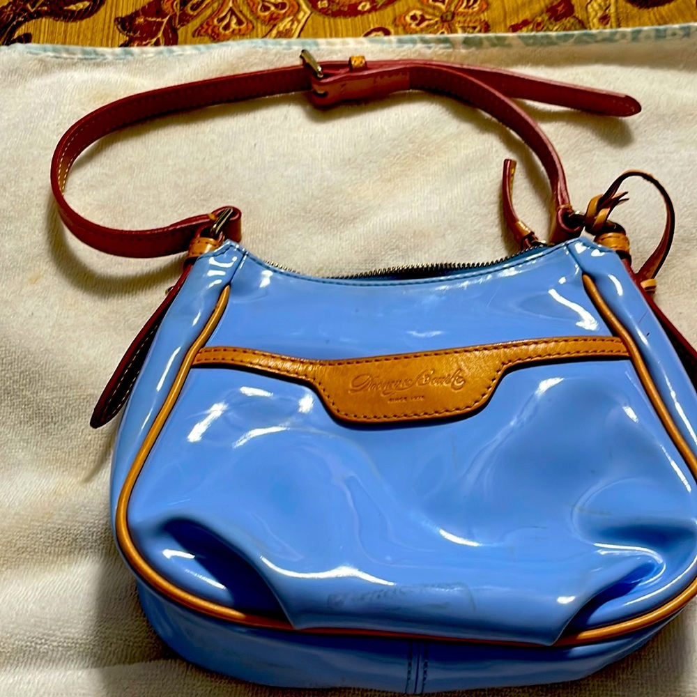 Dooney and Bourke Mini Margot Crossbody with shoulder strap.